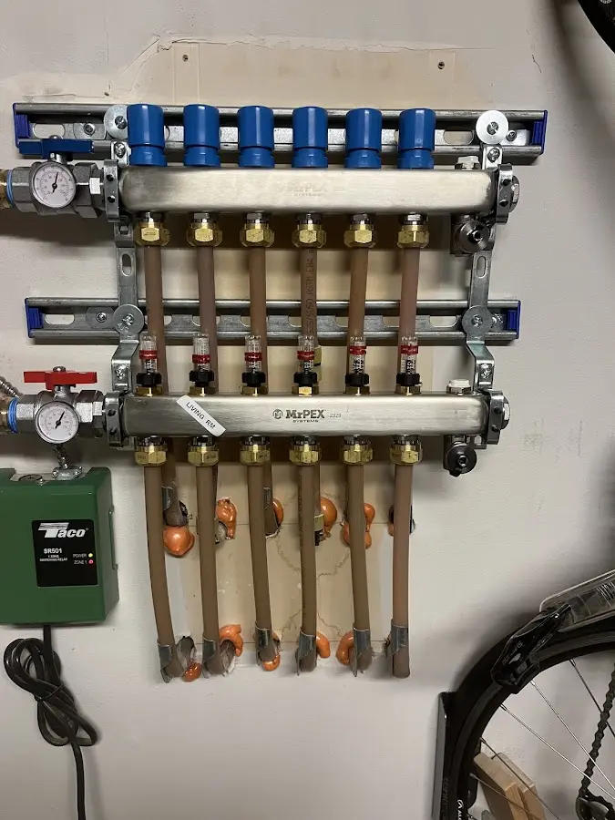 Plumber performing Gas Leak Detection at a residential property in Wood Village